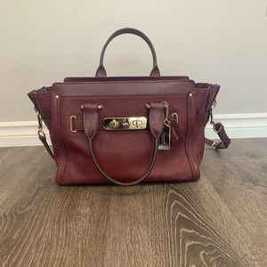 Authentic burgundy Coach purse.
